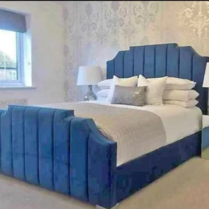 Elegant grey velvet Wingback Arizona bed frame with a high-panelled headboard and matching footboard.